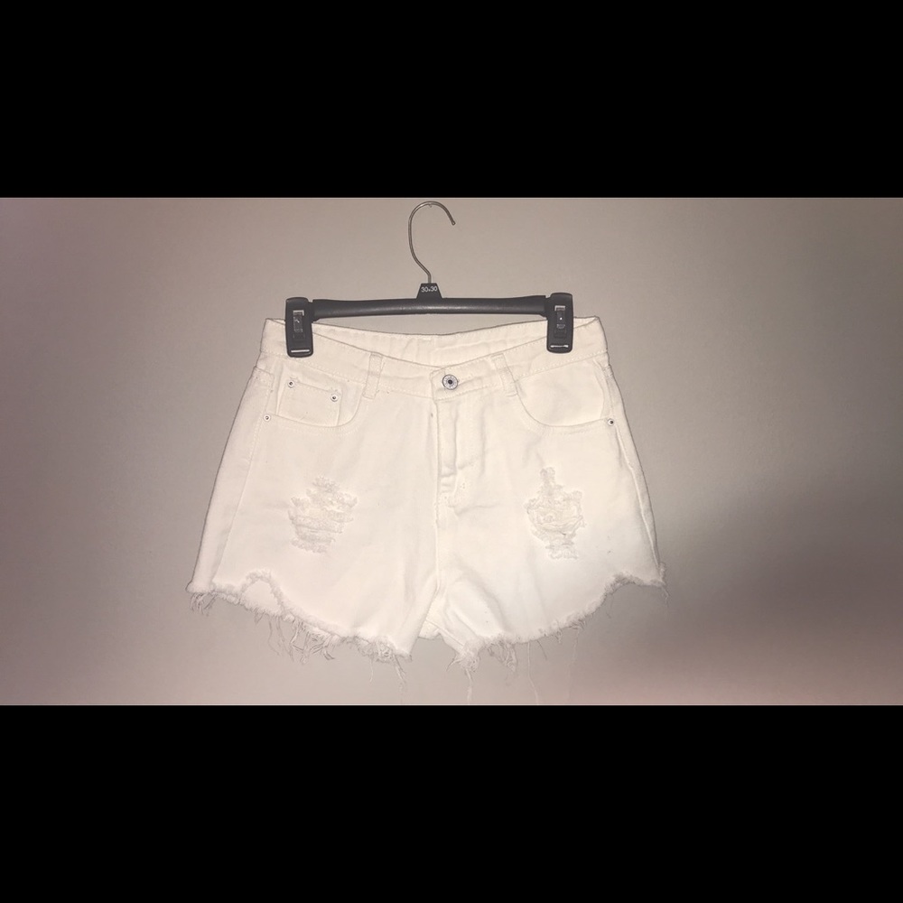 White high waisted distressed jeans